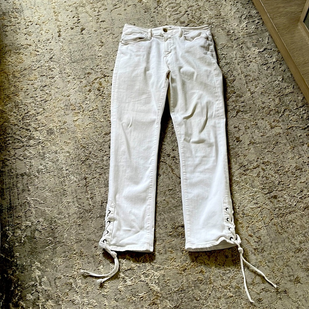 White skinny jean with a fun tie at the ankles.   Great stretch to this fabric